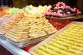 Istanbul, Turkey - August 4, 2023: Assortment of traditional turkish dessert baklava on a showcase of shop. Sweets as a food Royalty Free Stock Photo