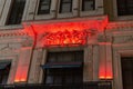 Demiroren Business Center Building and caribou cafe sign on istiklal street illuminated at night