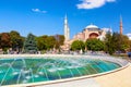 Istanbul, Turkey - August, 2018: Hagia Sophia Ayasofya museum with fountain in the Sultanahmet Park in Istanbul, Turkey during Royalty Free Stock Photo