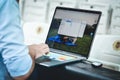 Istanbul, Turkey - August 14, 2019: Sports journalist working on a laptop before the UEFA Super Cup Finals match between Liverpool