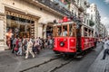 ISTANBUL, TURKEY - AUGUST 8, 2015: Tram going via one of the most famous avenues in Istanbul - ÃÂ°stiklal Caddesi