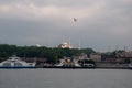 Cityscape of Istanbul at the evening, seaside view with silhouettes of mosques in old town. Istanbul skyline