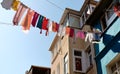 Istanbul, Turkey - 25.09.2020: Colourful clothes are air-dried on a warm sunny day on the old street of Istanbul, Balat