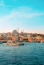 23.10.2019 Istanbul, Turkey. Cruise pleasure ship sails on the sea. In the background there is a horizon and a view of the city.