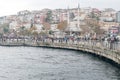 Anglers fishing in the Bosphorus Strait on Uskudar at cloudy day