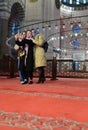 Tourist inside Suleymaniye Mosque. Istanbul. Turkey