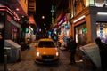 ISTANBUL, TURKEY - 9 DECEMBER 2020: yellow taxi on a istanbul narrow streets Royalty Free Stock Photo