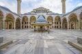 Fatih`s mosque courtyard shows the Islamic architecture of domes, minarets, pillars and ornaments.