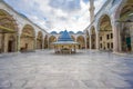 Fatih`s mosque courtyard shows the Islamic architecture of domes, minarets, pillars and ornaments.