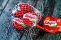 Istanbul, Turkey - February 23, 2018: Mini Babybel Cheese in Red Wax on Wooden Surface