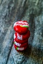 Istanbul, Turkey - February 23, 2018: Mini Babybel Cheese in Red Wax on Wooden Surface