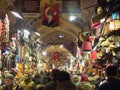 Istanbul, Turkey - Grand Bazaar with lots of people and all kinds of goods and Turkish flags