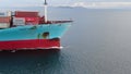 Aerial view of freight ship with cargo containers.