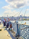 Citizens fishing on the Galata bridge. Istanbul, Turkey.