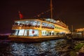 ISTANBUL, TURKEY - JULY 05, 2018: Night view of the old cruise vessel Emin Kul (built in 1989) on the Eminonu pier Royalty Free Stock Photo