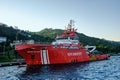 Istanbul, Turkey, July 14, 2021, a red fire ship on the Bosphorus stands on the pier