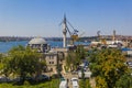 ISTANBUL, TURKEY - JULY 22, 2019: Sokullu Mehmet Pasha Mosque and port cranes in Istanbul, Turk
