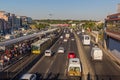 ISTANBUL, TURKEY - JULY 22, 2019: Traffic on D-100 Guney Yanyolu road with Sirinevler Metrobus Station in Istanbul, Turk