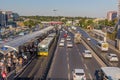 ISTANBUL, TURKEY - JULY 22, 2019: Traffic on D-100 Guney Yanyolu road with Sirinevler Metrobus Station in Istanbul, Turk