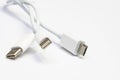 Close up electronic device chargers on white background