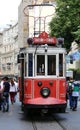 ISTANBUL,TURKEY-JUNE 7:A historic red tram in front of the Galatasaray High School at the southern end of istiklal Avenue.June 7,2