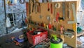 Workshop scene with many tools on the table and board