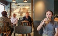 Istanbul, Turkey - June 02, 2017: Young man at Starbucks coffee shop in Istanbul. Royalty Free Stock Photo