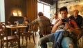 Istanbul, Turkey - June 02, 2017: Young man at Starbucks coffee shop in Istanbul. Royalty Free Stock Photo