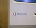 Istanbul, Turkey, March 2019: Closeup old rainbow Apple logo on old Macintosh computer. Rahmi Koc museum