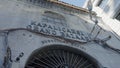 ISTANBUL, TURKEY - MARCH, 2021: Entrance to Turkish covered Bazaar. Action. Historical inscription above entrance to