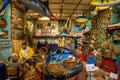 Istanbul, Turkey, 23 March 2019: Fisherman with boy in old boathouse with wooden boat, traditional fishing or nautical