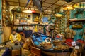 Istanbul, Turkey, 23 March 2019: Fisherman with boy in old boathouse with wooden boat, traditional fishing or nautical