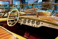 Istanbul, Turkey, 23 March 2019: Interior of vintage motor nautical boat Riva. Steering wheel of classic boat small Royalty Free Stock Photo