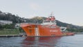 ISTANBUL, TURKEY - MARCH, 2021: Red ferry near coast. Action. Large red ferry moored to coast of Turkey. Turkish red