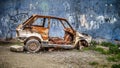 Istanbul, Turkey - March 03, 2013 - Rusty scrap car in Fener Balat district
