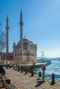 Istanbul, Turkey - March 26, 2019: View of Ortakoy mosque and Bosphorus bridge in Besiktas. Located at the waterside of Royalty Free Stock Photo