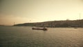 ISTANBUL, TURKEY - MAY 14, 2023. Aerial shot of the Ramus general cargo ship moving along the Bosphorus Strait