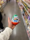 ISTANBUL, TURKEY - MAY 11 2019:  Kinder Surprise Maxi Holding in Hand at Supermarket for Sale Royalty Free Stock Photo