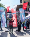 Man waving big poster of Kemal Kilicdaroglu photo in front of Republican Peoples Party kiosk, Ortakoy, Istanbul, Turkey