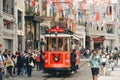 Istanbul, Turkey - May 02, 2023: Nostalgic traditional red tram in Beyoglu. The tram line runs along Istiklal