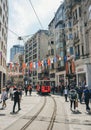 Istanbul, Turkey - May 02, 2023: Nostalgic traditional red tram in Beyoglu. The tram line runs along Istiklal