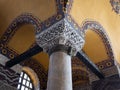 ISTANBUL, TURKEY - MAY, 23, 2019: an ornate capital on a cloumn inside hagia sophia mosque in istanbul Royalty Free Stock Photo