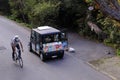 ISTANBUL, TURKEY - Nov 17, 2020: New electric car for public use at The Burgazada Istanbul and pedaling cyclist