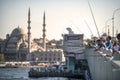 ISTANBUL, TURKEY - OCT. 09: Fishermen on Galata bridge of Istambul on oct, 09, 2013 in Istanbul, Turkey. Galata Bridge is Royalty Free Stock Photo