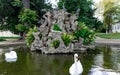 Istanbul, Turkey- October 6, 2021: Fountain with swans of Dolmabahce Palace during spring rain