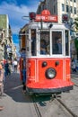 ISTANBUL, TURKEY - OCTOBER 23, 2014: Historical red old city tram along Istiklal Caddesi street Royalty Free Stock Photo