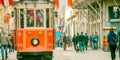 ISTANBUL, TURKEY - OCTOBER 26, 2014: Historical red old city tram along Istiklal Caddesi street Royalty Free Stock Photo