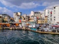 Parking lot and buildings with graffiti on the walls on the Bosphorus waterfront in Istanbul