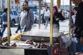 Istanbul, Turkey - October-6,2019: Snack food boiled corn on the counter. Chestnuts cooked on the grill. Traditional vendors of