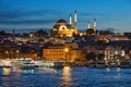 ISTANBUL, TURKEY - October 10th, 2019: View to Eminonu pier and Suleymaniye mosque across the Bay of Golden Horn after sunset Royalty Free Stock Photo